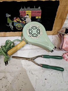 This is one of the coolest things I've listed. 1950s Handy Hannah mint green hair dryer. This is in excellent condition: no rust, no scratches. The cord is also mint green (came in two cord colors and the green one is the coolest in my opinion). Has an on/off, cold/hot switch. You can also adjust the flow. I saved the best part for last: IT WORKS Get this before it's gone! 1950s Hair, Mint Green Hair, 1950s Hairstyles, Saint Paul Mn, Salon Ideas, Saint Paul, My Opinions, Green Hair, Vintage 1950s