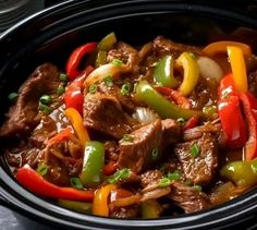 beef and peppers in a slow cooker