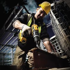 a man in safety gear using a power tool on some stairs with the words power tools uk