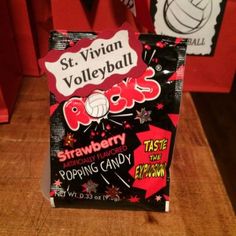 a package of st viian volleyball stickers sitting on top of a wooden table