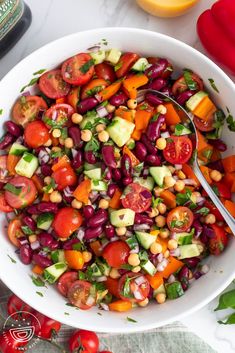 a white bowl filled with lots of veggies