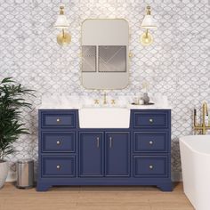 a bathroom with a sink, mirror and bathtub next to a plant on the floor