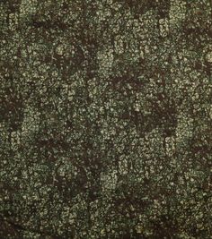 an image of green and white flowers on the surface of a granite slab or floor