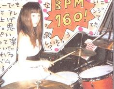 a woman sitting in front of a drum set with the words bpm 1960 written on it