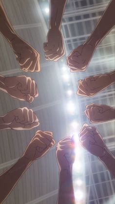 many hands holding each other in the middle of a circle with sunlight shining through them