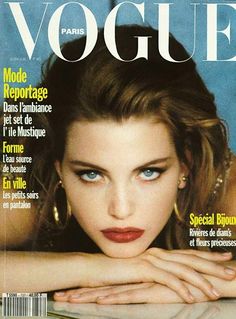 a woman with blue eyes on the cover of a magazine