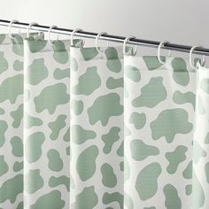 a green and white animal print curtain