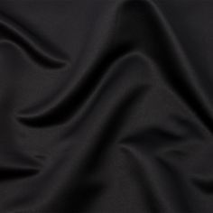 A classic color never looked better than with this Dominique Black Polyester Duchess Satin. Heavier and featuring a duller luster than regular satin, this duchess satin offers a smooth hand and no stretch. With a voluminous drape, craft dresses with statement sleeves, circle skirts, wide-leg trousers, and so much more. Opaque, a lining is not necessary but may be used for a polished finish. Classic Satin Dress For Party, Formal Solid Color Satin Dress, Formal Silk Satin Dress, Classic Silk Satin Dress For Formal Occasions, Classic Silk Satin Formal Dress, Solid Color Silk Satin Dress, Circle Skirts, Duchess Satin, Statement Sleeves