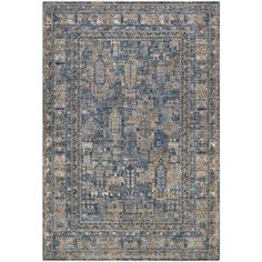 an area rug with blue, beige and tan colors on the bottom half of it