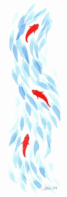 two red fish are swimming in the water