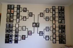 a wall with many different frames on it