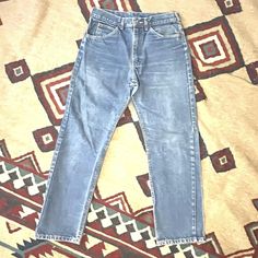 Vintage 1980s Lee Riders Jeans. Made in USA. Faded with a few small stains. No holes. Tagged size 32x30. Measures at 30x29. Measurements Across at Waist: 16" Rise: 11" Inseam: 30" Length: 38" Leg Opening: 16" We ship Monday through Friday. If there is a problem with the item, just contact us and we will resolve it. We examine the items carefully but sometimes make mistakes. We have been selling vintage clothing on different online platforms since 2003. Jeans Mens, Mens Jeans, Favorite Outfit, Vintage Outfits, Bathing Beauties, Mens Outfits, Music Clothes, Blue, Clothes