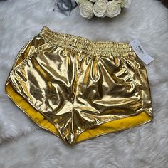 The Perfect Gold Shorts Size Xxl Please See Measurements. Has Pockets! These Shorts Are So Amazing! A Metallic Dream! #Goldshorts #Metallic #Guilded #Gold Gold Bottoms With Built-in Shorts For Summer, Gold Bottoms With Elastic Waistband For Summer, Gold Stretch Summer Shorts, Gold Stretch Bottoms Short Length, Gold Stretch Short Bottoms, Gold Bottoms For Summer Vacation, Spring Beach Gold Bottoms, Gold High-waisted Shorts For Summer, Summer High-waisted Gold Shorts