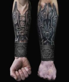 two men's arms with tattoos on them, one is black and the other is grey