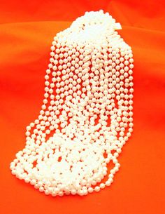 White Party Beads | Adult Party Ideas & Decorations Adult Party Ideas, Pearl Anniversary, Quinceanera Planning, Pearl Party, Quinceanera Party, Birthday Party Celebration, Bead Necklaces, Pearl Necklaces, 15th Birthday