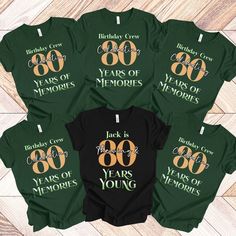 six t - shirts with the words 80 years of memories printed on them in gold and green