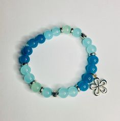 Perfect for besch trips 🤍 comes with several bracelets Cute Handmade Blue Charm Bracelet, Lilo And Stitch Beaded Bracelet, Ocean-inspired Blue Beaded Bracelets, Handmade Ocean-inspired Charm Bracelet For Gifts, Ocean-inspired Blue Charm Bracelet For Beach, Beaded Crafts, Pendant Necklaces, Jewelry Necklace Pendant, Beauty Book