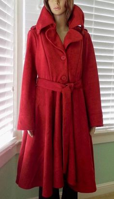 This is a Gorgeous Red Coat. It is a heavy weight faux suede coat with a wide button down collar and 4 buttons down the front. This mod stylish dress coat has a wrap around sash belt and a full circle skirt with hidden snaps on the insides that you can hitch it up for a frilly peplum. it is in Excellent Condition! Label:     CQ BY CQ  Size:      Large 10 (Double Check Measurements) Measurements are taken with the garment LAYING FLAT. DOUBLE where applicable. Shoulder to Shoulder:     18" Sleeve Length:                 23" Armpit to Armpit:            20" Waist:                                19" Hips:                                  28" Full Circle Skirt:                       90" Length From Back Collar:  42" Model Measurements: 33 24 34  5' 7" This garment is clean and ready to wear. Vi Pendleton Coat, Long Wool Coat Women, Red Overcoat, Red Winter Coat, Fit And Flare Coat, Red Princess, Suede Trench Coat, Princess Coat, Red Trench Coat