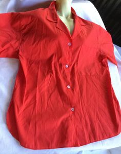 Red Polyester and Cotton blend oxford short sleeve blouse, size 18. Please take a look at my storefront at: https://www.etsy.com/shop/FabFinds42?ref=seller-platform-mcnav I have a wide selection of one-of-a-kind items, from clothing and toys to home decor and gift items, and I add new things almost every day. Plain Short Sleeve Shirt For Spring, Red Shirt For Summer Daywear, Red Summer Shirt For Daywear, Red Collared Top For Summer, Red Summer Daywear Shirt, Classic Plain Summer Blouse, Classic Plain Blouse For Summer, Red Collared Shirt For Summer, Classic Plain Cotton Blouse