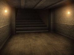 an empty room with some stairs and lights