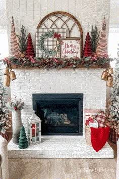 a fireplace decorated for christmas with red and green decorations