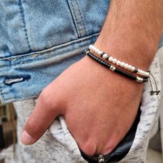 White freshwater pearls with sterling silver spacers and large special fastening (available in  14K gold plated) for you the groom who is looking for a unique accessory on your wedding day. Classic but unique with a timeless quality. 𝗦𝗶𝘇𝗲𝘀: There are different sizes for the bracelets 5.8" (14.7 cm) 6.4" (16.2 cm) 7.3" (18.5 cm) This bracelet is intended to be layered, which means this bracelet will complement pieces you already own. * Choose your bracelet size by measuring your wrist and ad Modern White Bracelets With Round Beads, Modern White Round Bead Bracelets, Modern White Round Beads Bracelets, Modern White Round Beaded Bracelets, Classic Adjustable Beaded Bracelets With Silver Beads, White Modern Beaded Bracelets, Modern White Beaded Bracelets, Modern White Beaded Bracelet, Adjustable Pearl Bracelet With Silver Beads