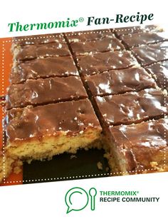 there is a cake with chocolate frosting on it and the words thermomiia fan - recipe