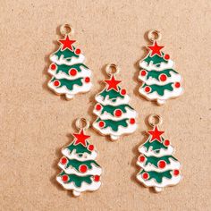 "ENAMEL CHRISTMAS TREE CHARMS, PENDANTS, HOLIDAY TREE CHARMS, CHRISTMAS TREE CHARMS, HOLIDAY CHARMS. ALL PRODUCTS READY TO SHIP FROM NEW YORK, USA! ALL ORDERS SHIP USPS FIRST CLASS MAIL! AT CHECKOUT YOU CAN UPGRADE TO PRIORITY MAIL AND 1-2 EXPRESS MAIL. ESTIMATED TIME OF ARRIVAL METHODS BELOW: USPS FIRST CLASS: 2-5 DAYS. USPS PRIORITY MAIL: 1-3 DAYS. EXPRESS MAIL: 1-2 DAYS. COLOR: AS PICTURED SIZE: 14MM X 25MM HOLE DIAMETER 2MM. MATERIAL: ALLOY. BACK: FLAT ON THE BACK. QTY: 4 PCS. All of our pro Tree Charms, Christmas Tree Charm, Christmas Charms, Bracelet Diy, Accessories Diy Jewelry, Enamel Charms, Holiday Tree, How To Make Earrings, Diy Earrings