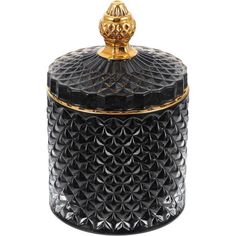 a black glass jar with gold accents