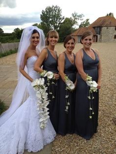 Bouquets always look best when carried by the bride. How stylish do the bridesmaids look with their wrist corsages. Bridal Corsage Wrist The Bride, Wrist Bouquet Wedding, Lilac Wedding Bouquet, Bridal Cuff, Wrist Corsages, Cascading Wedding Bouquets, Bridesmaid Duties, Wedding Notes