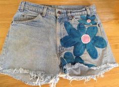 "These are new or vintage  made to order shorts.These shorts are distressed and have been pre-washed. I decorated them with vibrant blue and pink flowers on both sides. I used permanent textile paint. I hope you love them. These come in every size,or send me your favorite shorts to paint. Then, these are rust suede tie dye long shorts and high waisted. The waist is 28\" and the length isb24\". They are lined . These were made from designer suede pants.  They are 99$. Send me a conversation if you want them. S hipping is two day priority in the U.S. And first class everywhere else. Thankyou for visiting my shop. Please come back again. Send me a conversation as to what exactly you want. You can customize these in different colors." Flower Jeans, Suede Shorts, Suede Pants, Painted Jeans, Distressed Jean Shorts, Levi Shorts, Long Shorts, Short En Jean, Vintage Shorts