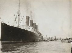 an old photo of a large ship in the water