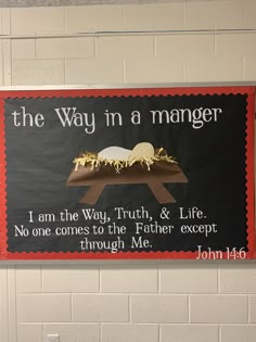 a sign that says the way in a manger