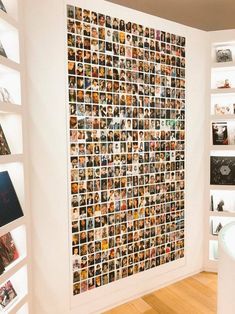 a room filled with lots of pictures on the wall