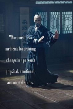 an image of a man with his hands out in front of him, saying movement is a medicine for creating change in a person's physical, environmental, and mental states