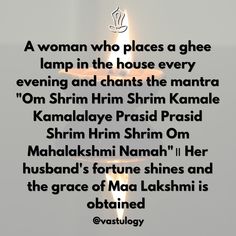 a woman who places a ghee lamp in the house every evening and chats the mantra om shrim