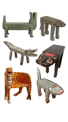 four different types of animal shaped objects on white background, including zebra, tiger and giraffe