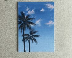 a painting of two palm trees against a blue sky with white clouds in the background