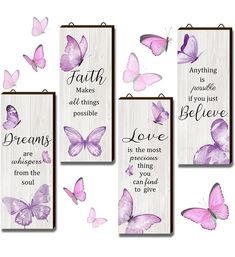 four purple butterflies with the words, faith and some sayings on wooden plaques in front of them