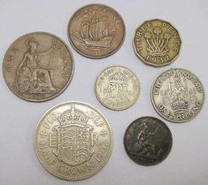 five different british coins are shown in this image