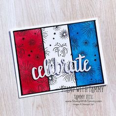 a close up of a card with fireworks on it and the words celebrate written in cursive writing