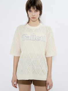 This is a trendy and unique top by FALLETT that is made out of high quality and sturdy material. With distinctive mood of the design and comfortable wear, you can style it for your casual and young daily outfit.- Relaxed loose silhouette- Logo embroidery on the front- Young and unique mood Casual Pointelle Knit T-shirt For Spring, Casual Pointelle Knit T-shirt For Summer, Casual Crew Neck T-shirt With Knit Fabrication, Beige Letter Print Sweater For Spring, Trendy Short Sleeve Knit Top For Loungewear, Summer Crew Neck Knit Top, Oversized Cotton Short Sleeve Knit Top, Oversized Cotton Knit Top With Short Sleeves, Oversized Cotton Knit Top, Casual Style