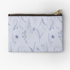 a blue and white floral print zippered pouch