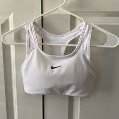 Nike Sports Bra, Never Worn. Size Xs As It Was Too Small For My Daughter. Bra Cup Is All One Piece. Nike Sporty Sports Bra For Light Activities, Nike Sporty Sports Bra For Light Sports, Nike Fitted Running Sports Bra, Nike Sports Bra For Gym, White Sports Bra For Gym, Comfortable White Sports Bra, White Fitted Sports Bra For Workout, Nike Fitted Sports Bra Sweat Resistant, Nike Fitted Sweat Resistant Sports Bra