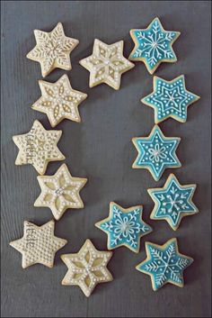 several decorated cookies arranged in the shape of snowflakes