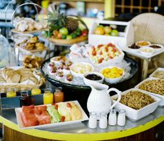 a table filled with lots of food and drinks