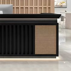 an office with a black and white reception desk