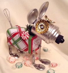 a christmas decoration made out of old kitchen utensils