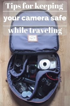 an open camera bag sitting on top of a wooden floor with the words tips for keeping your camera safe while traveling