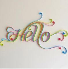 the word hello is made out of colored paper